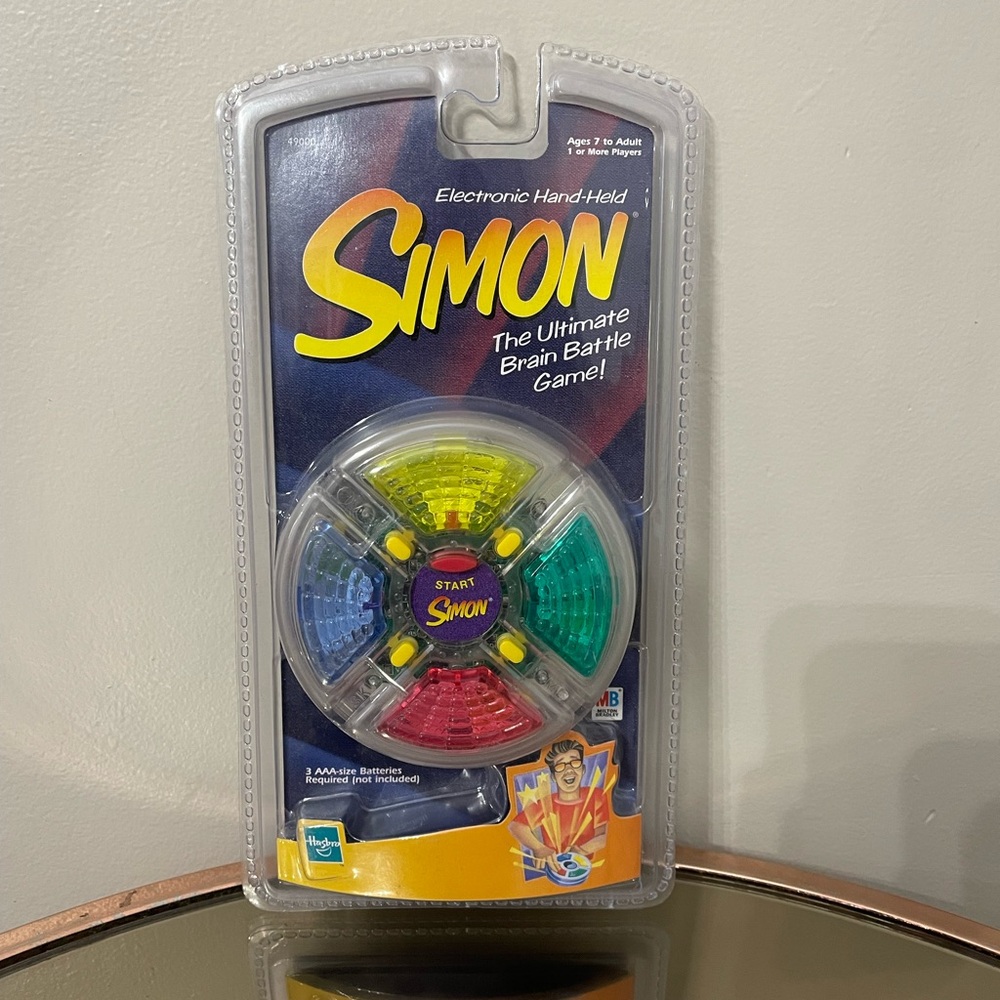 VNTG 1999 Mini Simon handheld‎ electric memory game w/ lights sound NEW